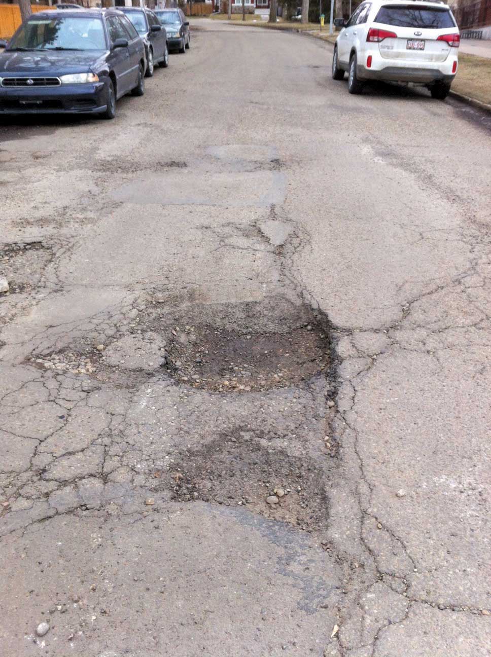 potholes on a road 