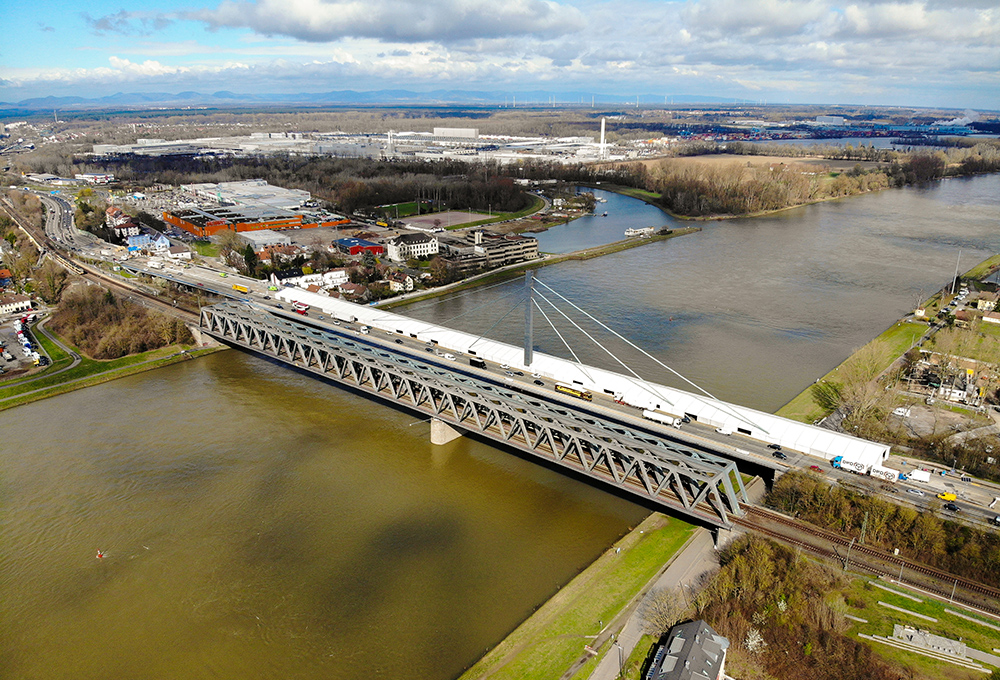 Kontent Structures installed an 18.5m-wide by 335m-long tent along the entire length of a bridge over the Rhine River in Karlsruhe, Germany, for work to continue regardless of weather (image courtesy Kontent Structures)