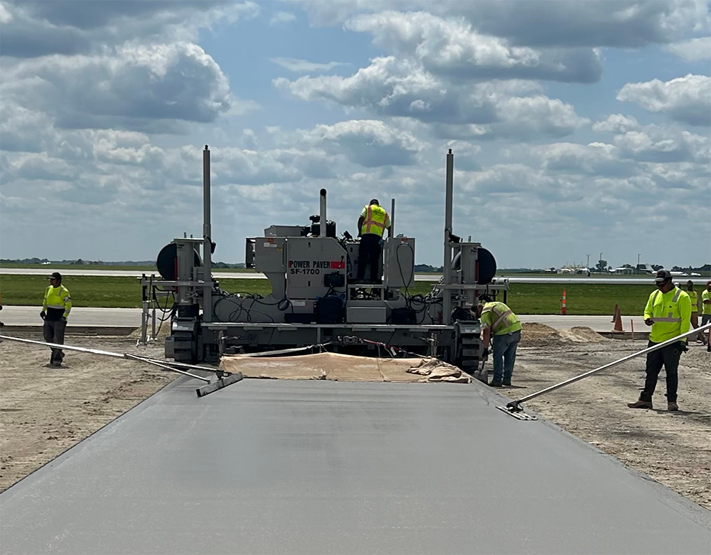 Contractor Metro Paving has been using an SF-1700 slipformer from Power Pavers to lay slab for new taxiways