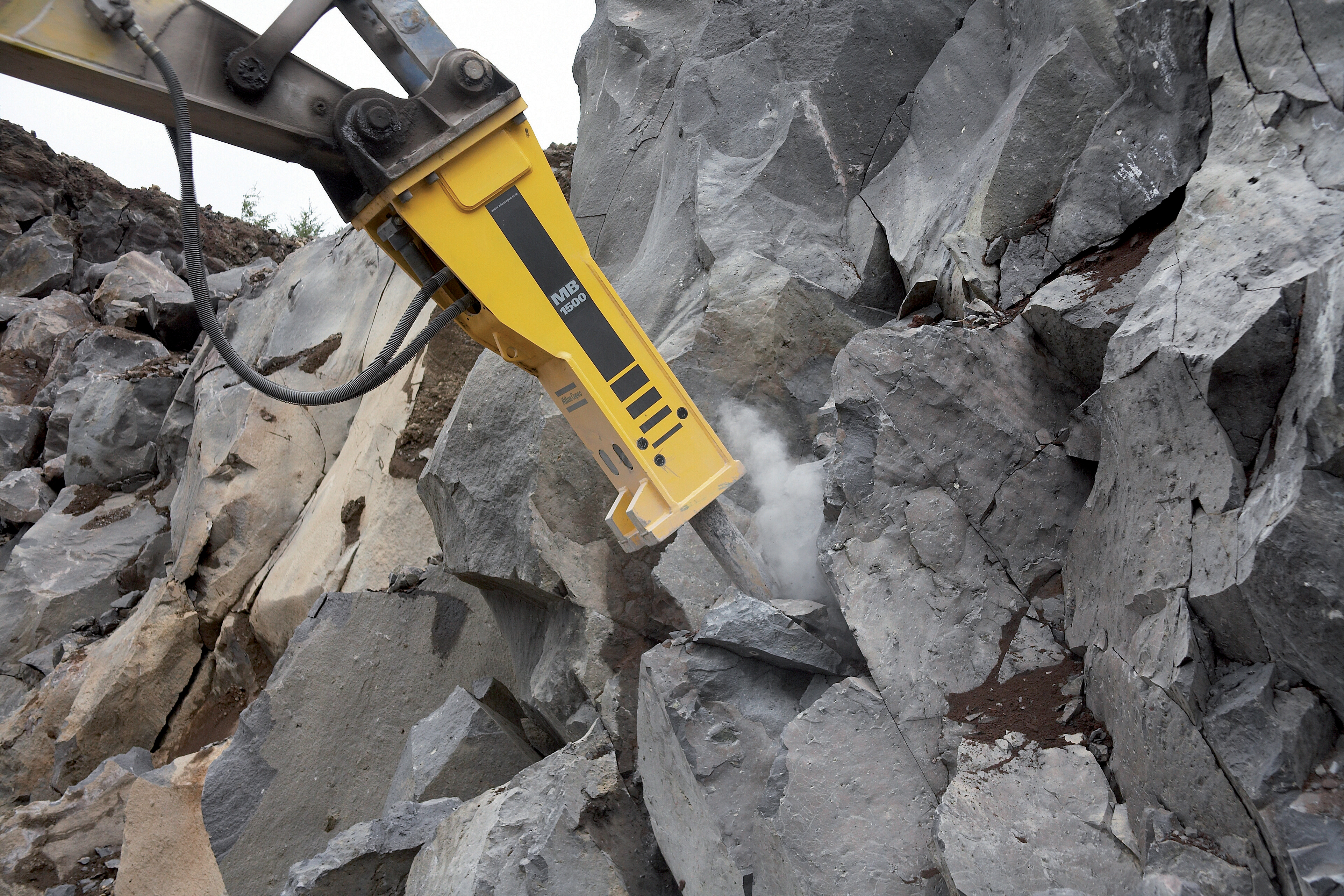 Drilling breaker into rocks 