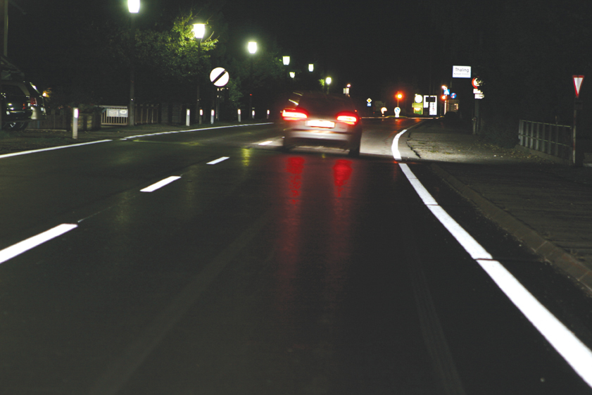 road at night with clear road markings