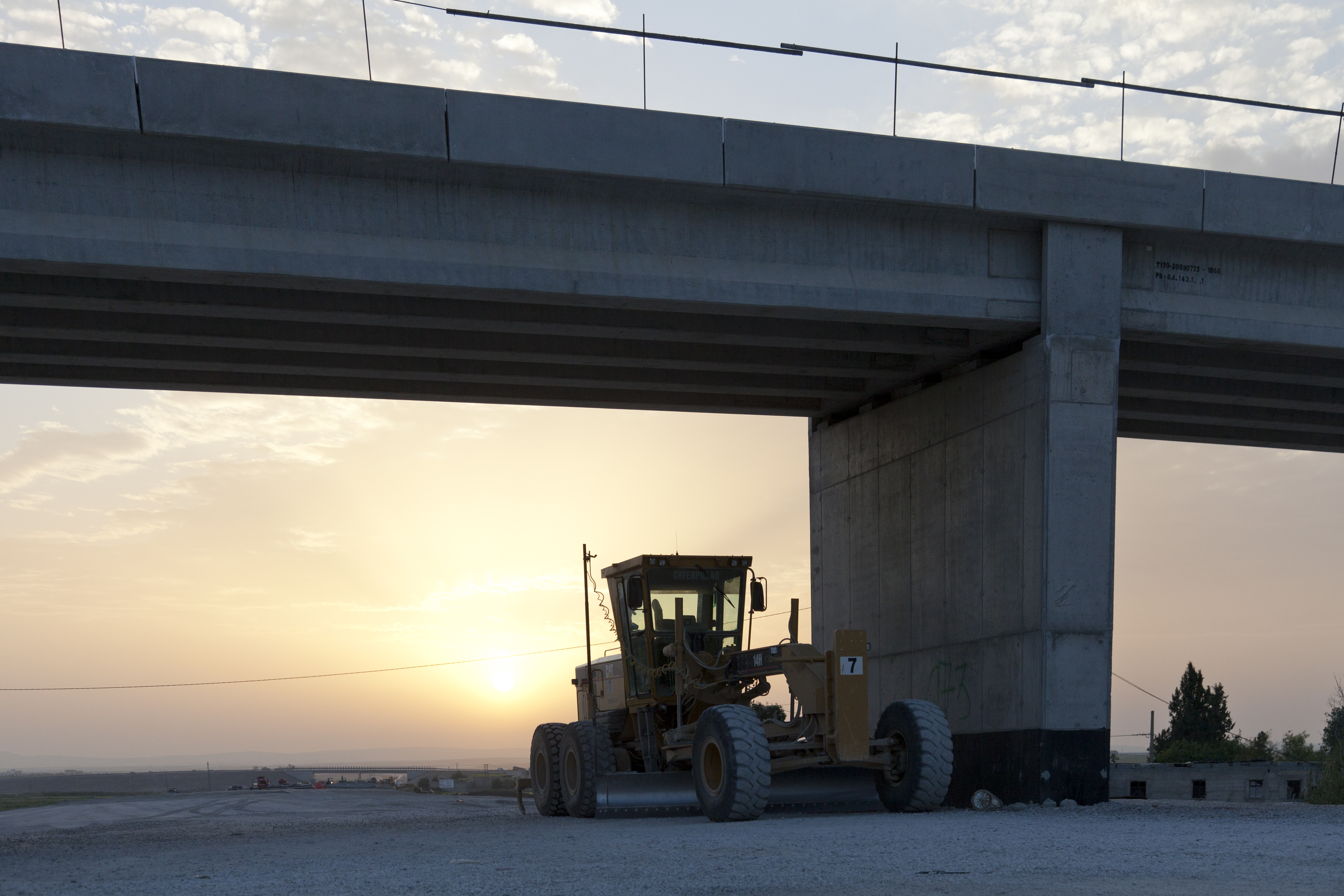 caterpillar machine in the sunset