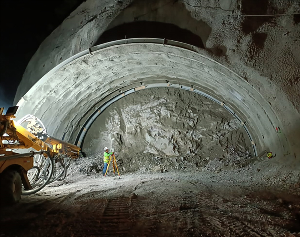 Conventional drilling and blasting methods are used to drive the tunnel sections, with shotcreting and bolting then employed to secure the walls