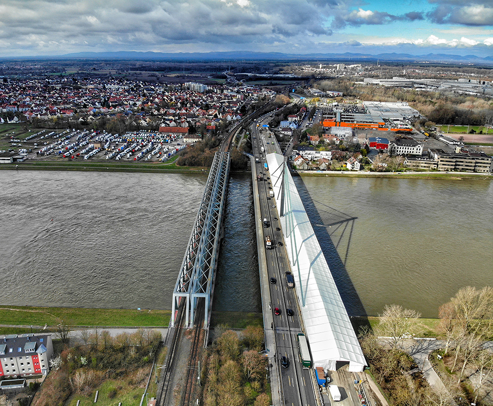 Kontent Structures installed an 18.5m-wide by 335m-long tent along the entire length of a bridge over the Rhine River in Karlsruhe, Germany, for work to continue regardless of weather (image courtesy Kontent Structures)