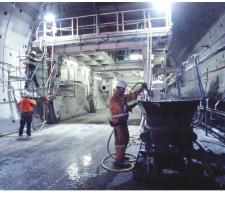 Men working inside the Brisbane Gateway tunnel