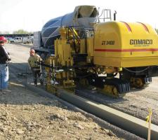 Compactor working on the road