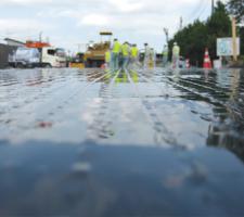 roadway improvements with fibreglass grid