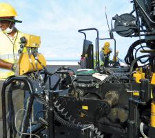 Caterpillar paver was used to place three layers of asphalt 