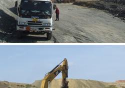 service and fuel trucks and CAT breaker with a hydraulic hammer