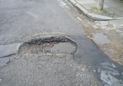 pothole on a road 