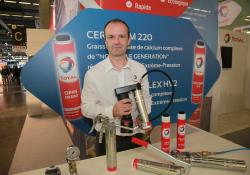 Total director Rafael Roux with Lube-Shuttle system 