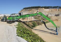 Sennebogen excavator pumping dolomite grit 