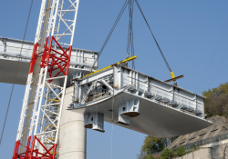 Another bridge deck section is carefully lifted into place (photo courtesy Salini Impregilo/PerGenova)