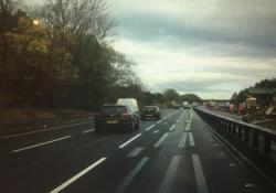 The white line towards the top of the picture shows a standard road marking, while in the foreground is one of the alternatives being tested