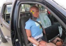 Ready to roll: a pick-up truck with the EuroNCAPs sophisticated injury-monitoring dummy onboard