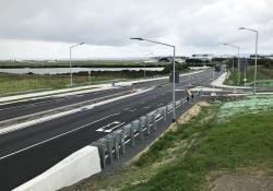 The road now features modern crash barriers and end treatments to ensure safety for drivers