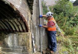 Installation of an OTT ecoLog 1000 water level logger in a stilling well with cellular data connection to Hydromet Cloud for the Vales Burn bridge trial in Scotland (image courtesy OTT HydroMet/Transport Scotland) 