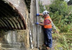 Installation of an OTT ecoLog 1000 water level logger in a stilling well with cellular data connection to Hydromet Cloud for the Vales Burn bridge trial in Scotland 