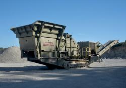 Caterpillar crushing in quarry site 