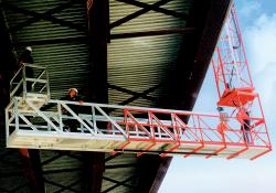 Man on platform under bridge