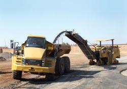 Caterpillar dump tuck being loaded up 