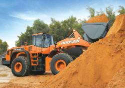 Doosan loader hauling sand