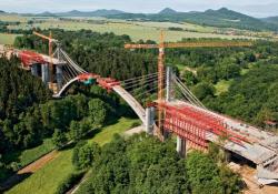 arched bridge crosses the Oparno Valley