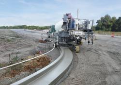 Wirtgen's new SP15 pouring curved barrier