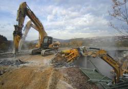 removing an old road bridge