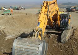 excavator working on Greek's highway