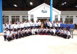 Staff outside the new Doosan facility in India 