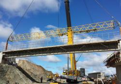 Manitowoc cranes constructing a bridge 