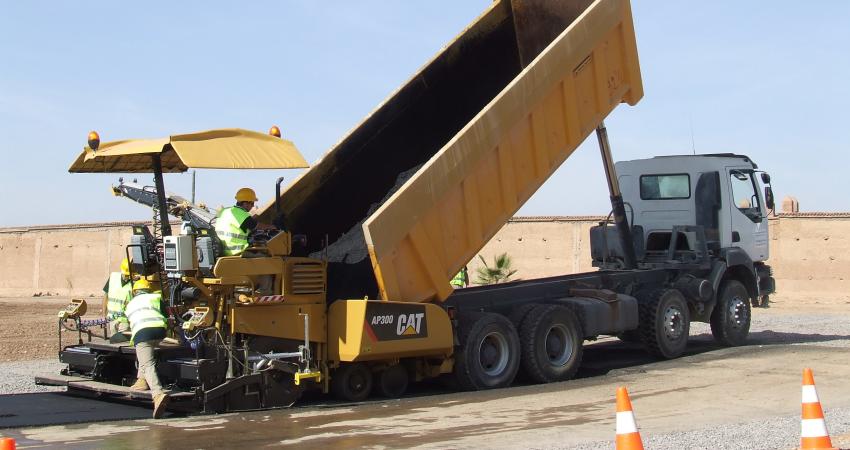 Cat AP300 paver being loaded