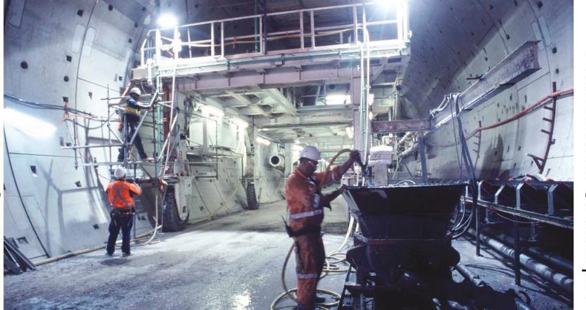 Men working inside the Brisbane Gateway tunnel