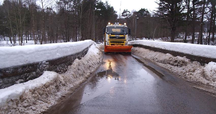 Snow Plough clearing snow and ice