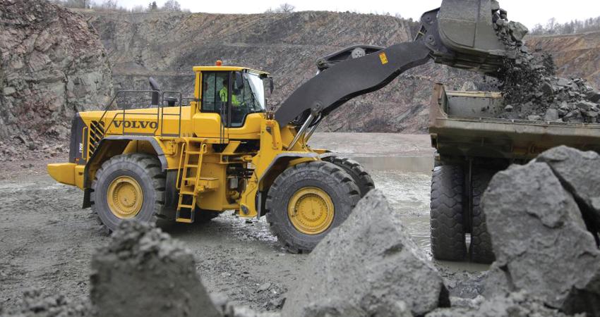 Volvo CE wheeled loader transports the granite in south indian villages