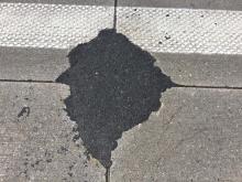 Macismo International suits repairs of pothole