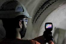 Engineer, uses a thermal imaging camera