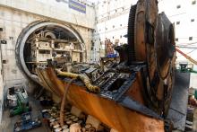 Trailing support gear was dismantled from the rear of the TBM train and carted back down the tunnel to south launch portral (photo WSDoT).jpg