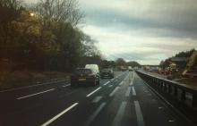 The white line towards the top of the picture shows a standard road marking, while in the foreground is one of the alternatives being tested