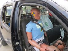 Ready to roll: a pick-up truck with the EuroNCAPs sophisticated injury-monitoring dummy onboard