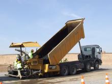 Cat AP300 paver being loaded