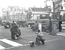 Men painting Zebra crossing in 1948