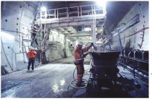 Men working inside the Brisbane Gateway tunnel