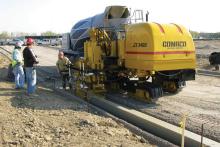 Compactor working on the road