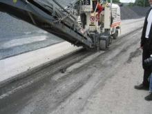 Milling the asphalt surface course incorporating HaTelit