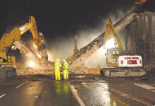 Powerful demolition tools removing the bridge 