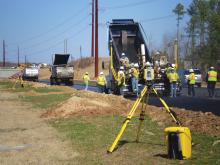 Machine control system at the roadside