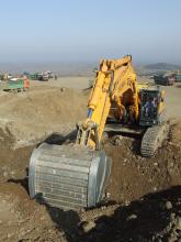 excavator working on Greek's highway