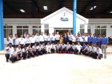 Staff outside the new Doosan facility in India 